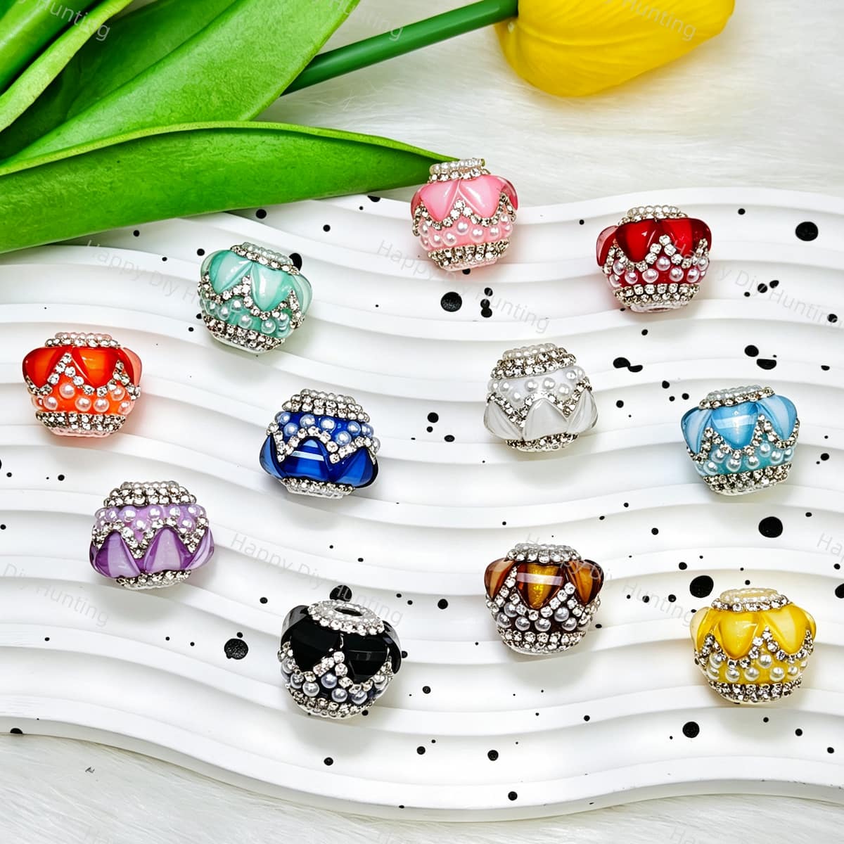 18mm crown-shaped beads decorated with multi-color pearls and sparkling rhinestones. Elegant and shiny, perfect for beadable pens, keychains, and handmade crafts.