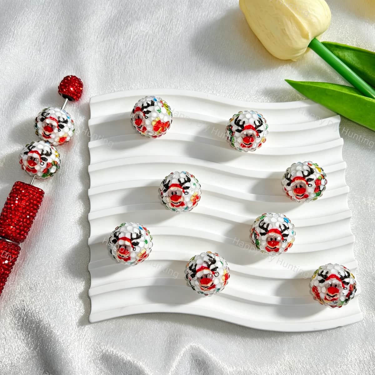 20mm round rhinestone beads featuring a festive Christmas reindeer design. Sparkly surface with red, green, and silver tones, perfect for beadable pens, keychains, and holiday jewelry making.