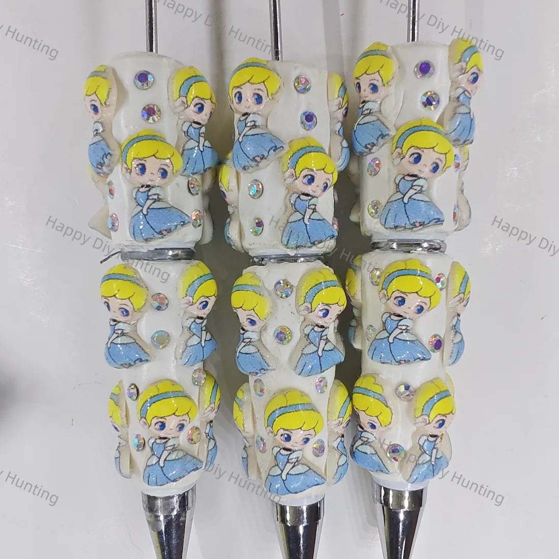 pre‑assembled blue‑gown blonde princess 3D figurine beadable pens, glitter off‑white base with sparkling rhinestones, cute girl themed craft ballpoint pens bulk