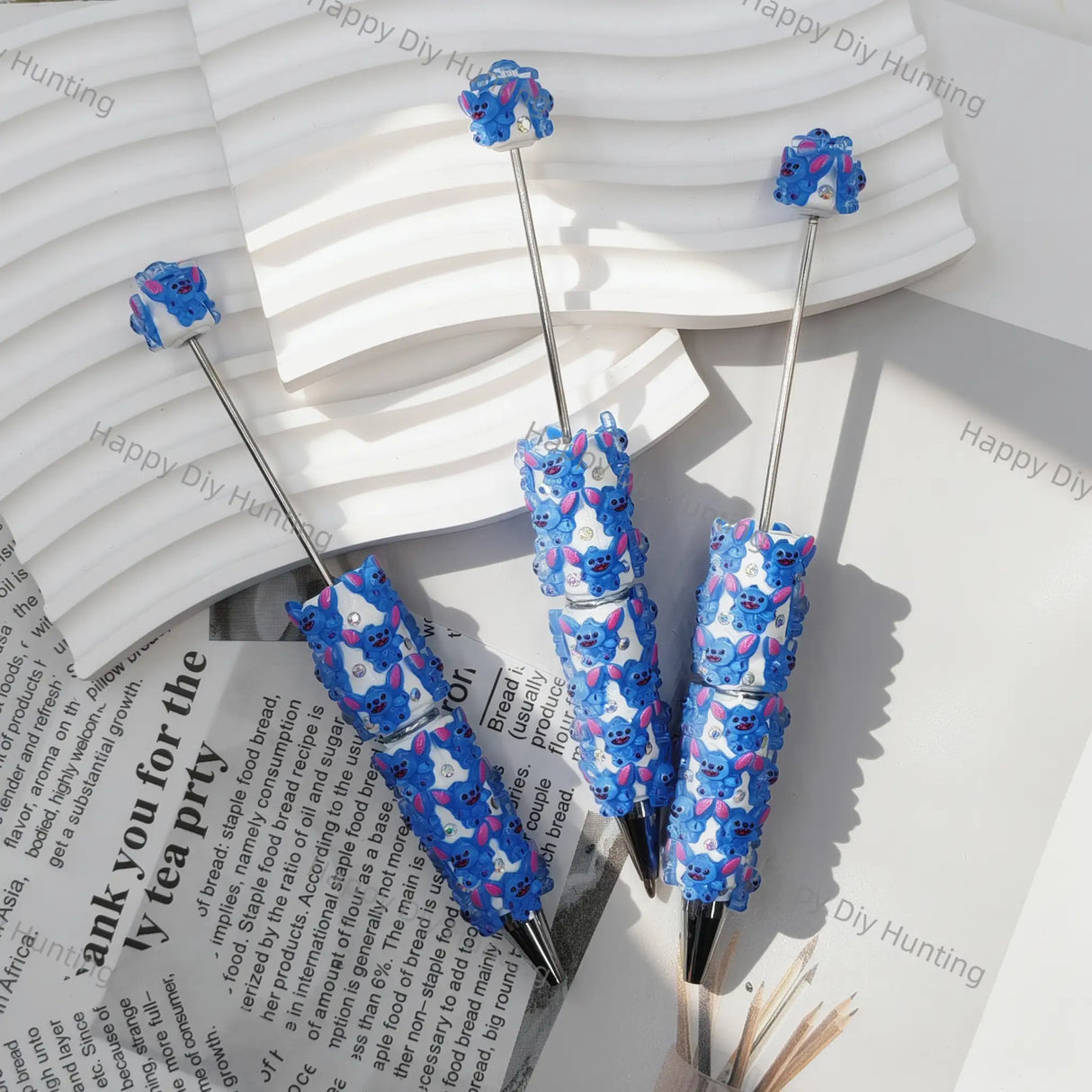 bright blue‑pink playful alien creature print beadable pens for diy silicone focal bead craft wholesale