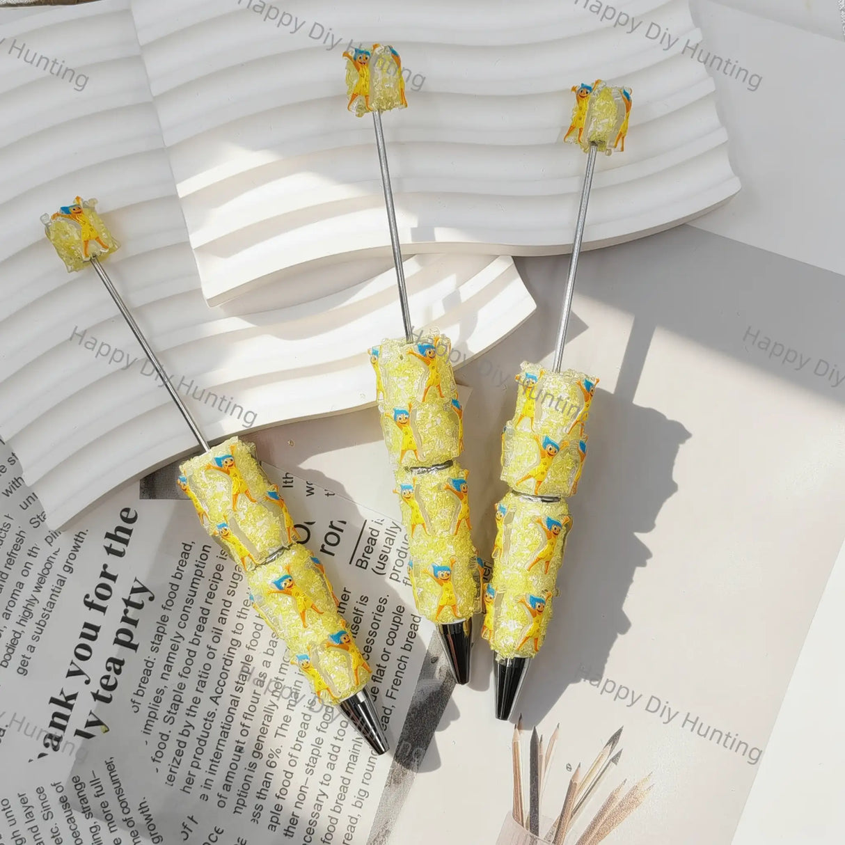 cheerful bright yellow whimsical little character print beadable pens for diy silicone focal bead craft wholesale