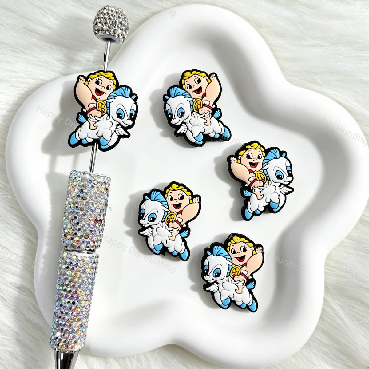 Silicone focal beads featuring a cute baby hero riding a winged horse cartoon design. Soft, durable, and flexible, perfect for beadable pens, keychains, and handmade crafts.