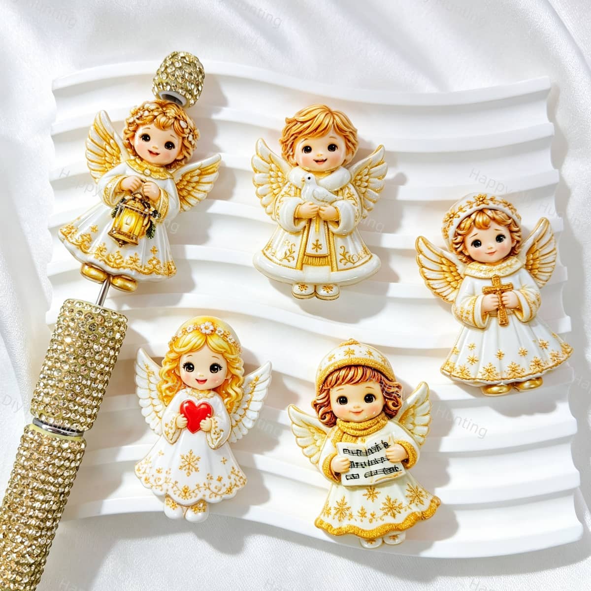 Acrylic focal beads featuring a golden and white angel print design. Lightweight, elegant, and durable, perfect for beadable pens, keychains, and handmade crafts.