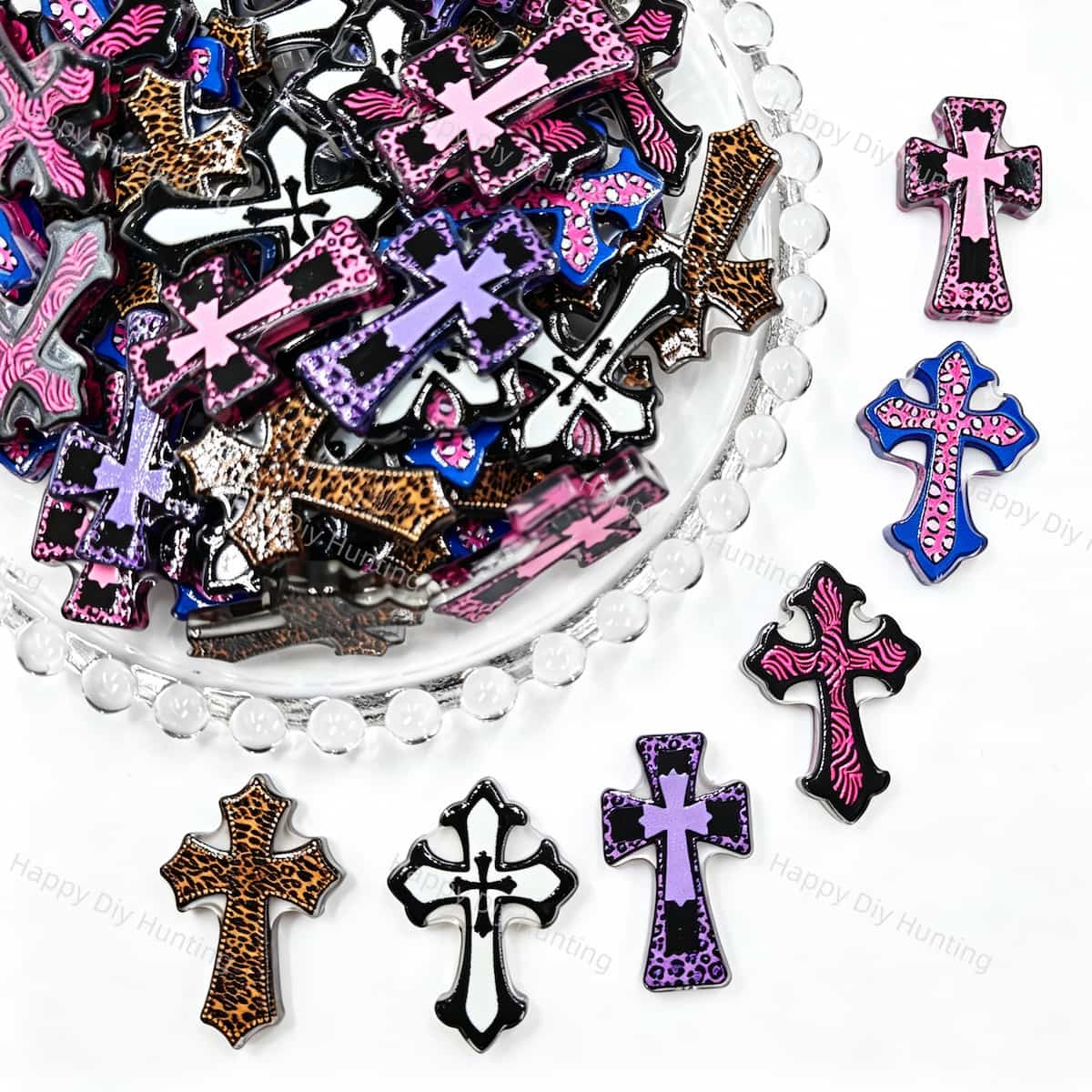 Cross-shaped acrylic focal beads featuring a mix of leopard and zebra animal prints. Lightweight, stylish, and durable, perfect for beadable pens, keychains, and handmade crafts.