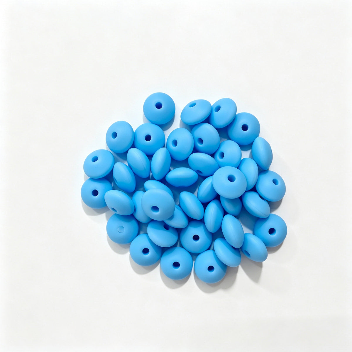 Light blue round acrylic spacer beads. Smooth, lightweight, and colorful, perfect for beadable pens, keychains, and handmade crafts.
