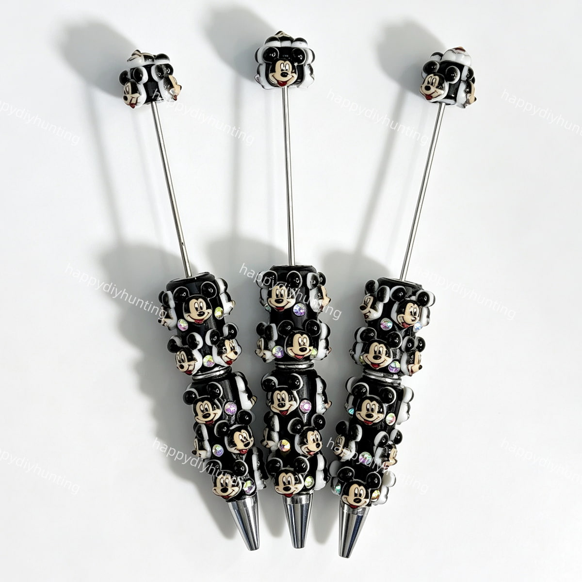 close-up black cartoon mouse beadable pen showing cartoon mouse design and beadable barrel