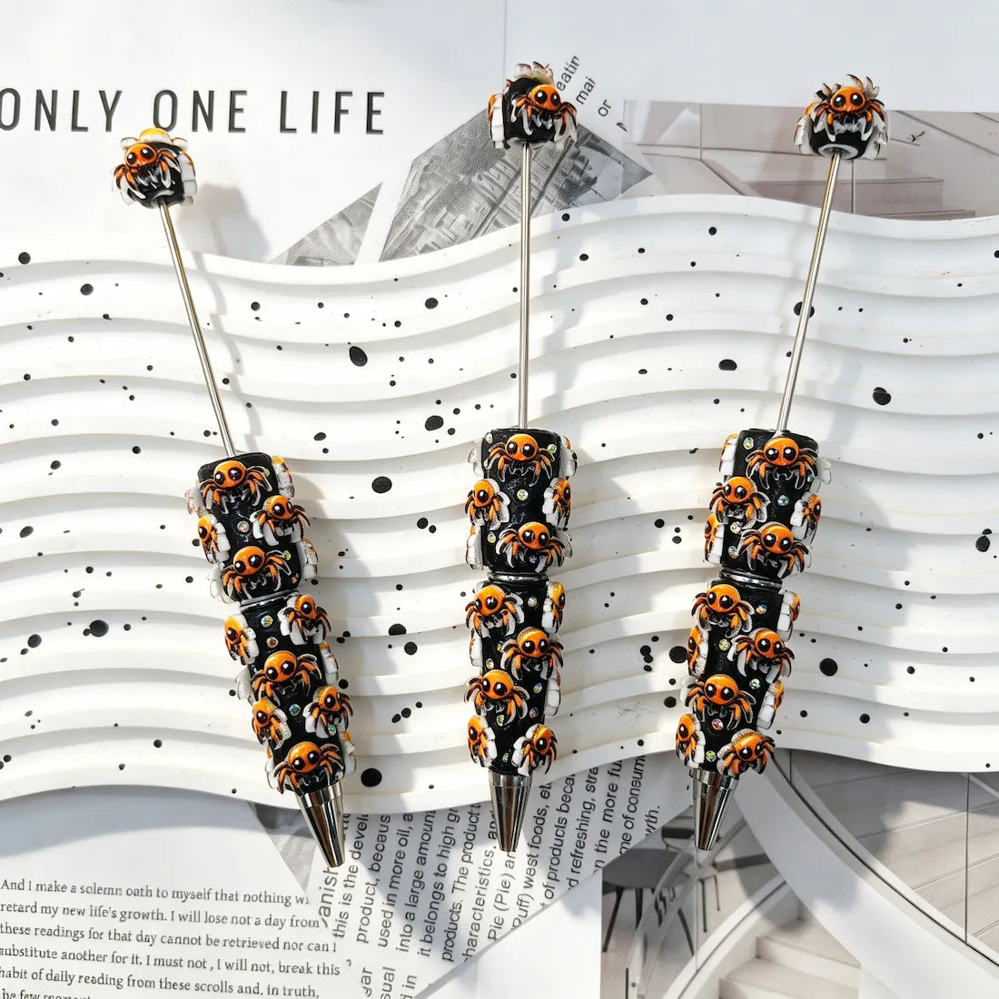 black base orange‑white spooky spider graphic decorated beadable pens for halloween diy handmade craft stationery wholesale