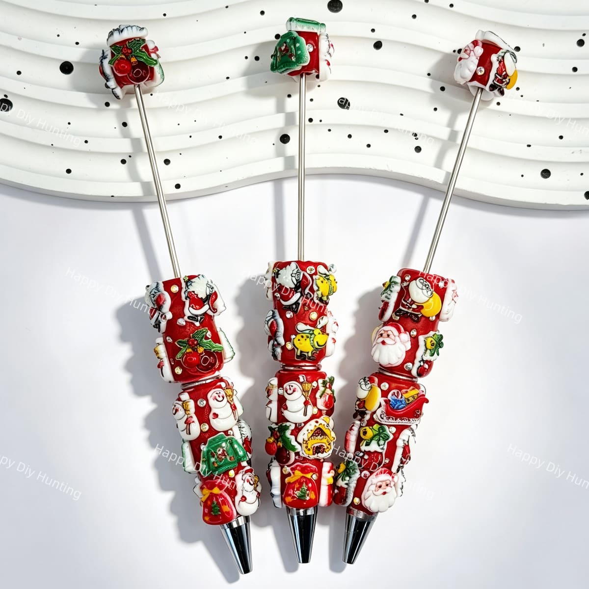 close-up Christmas themed beadable pen showing holiday design and beadable barrel