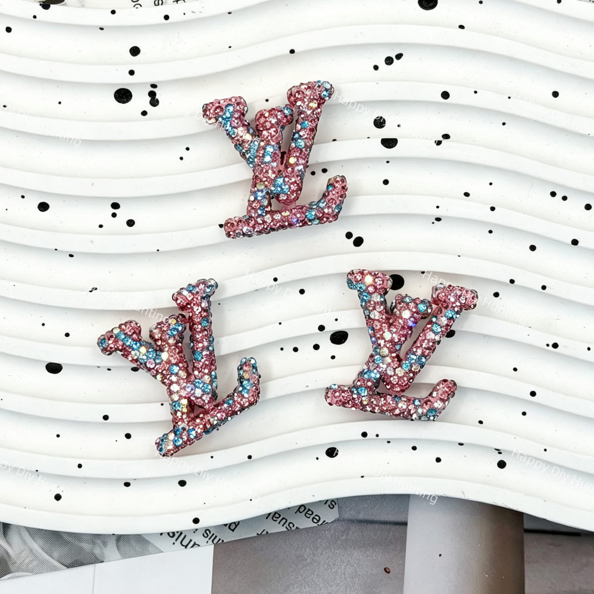Sparkly pink‑blue mixed crystal LV shape charm, perfect for DIY pen, phone case, hair clip, resin craft decoration.