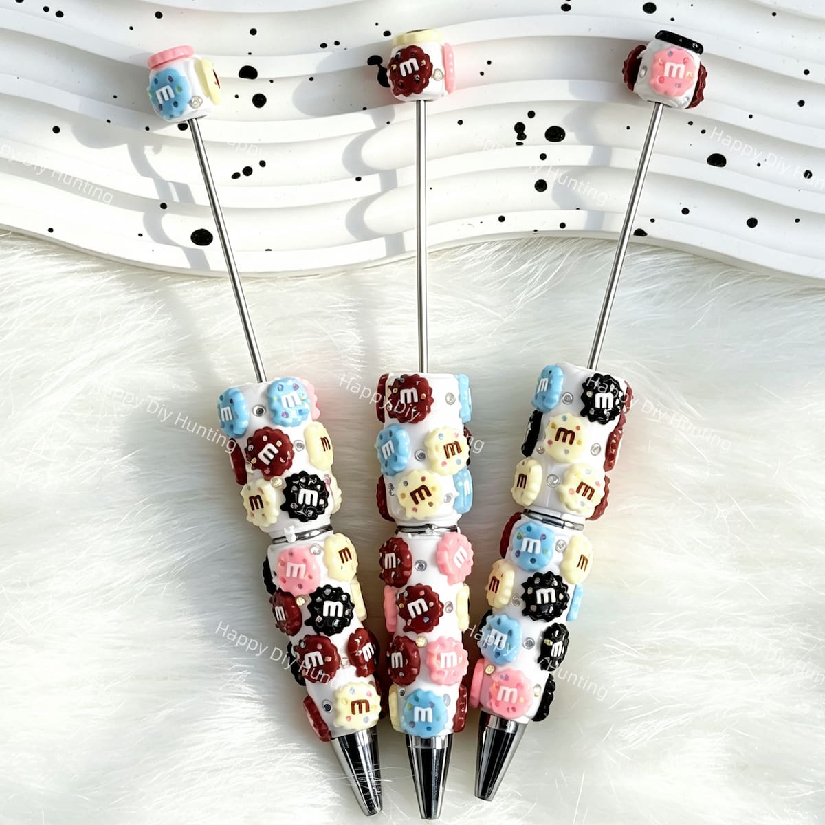 close-up multicolor candy-shape beadable pen showing candy design and beadable barrel