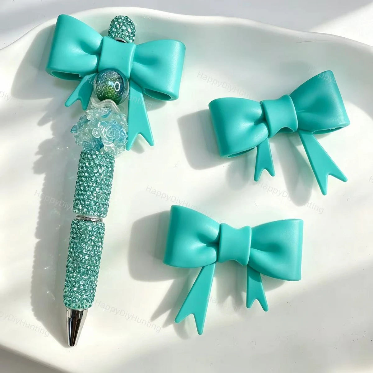 Teal solid bow silicone focal beads for DIY beadable pens