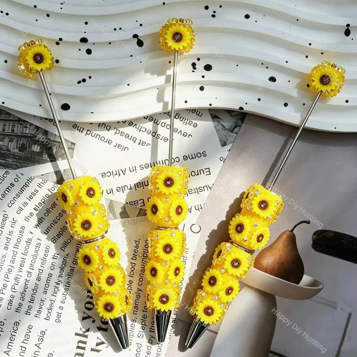 yellow sunflower 3d beadable pens floral theme with rhinestones on display for diy stationery and handmade gifts