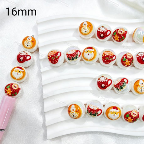 16mm round acrylic beads featuring a Christmas hot cocoa, snowman, and Santa print design. Lightweight, festive, and durable, perfect for beadable pens, keychains, and handmade holiday crafts.