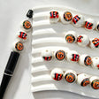 16mm round acrylic beads featuring a sport tiger team logo print design. Lightweight, colorful, and durable, perfect for beadable pens, keychains, and handmade crafts.