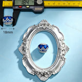 18mm dark blue crown-shaped bead decorated with pearls and sparkling rhinestones. Elegant and shiny, perfect for beadable pens, keychains, and handmade crafts.