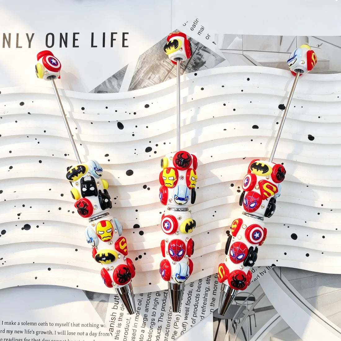 white base mixed pop‑culture hero symbol graphic decorated beadable pens for diy handmade craft stationery wholesale