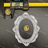 A yellow gemstone ring displayed in an ornate silver oval frame, with a digital caliper above showing the ring's width measurement of 2.00 mm.