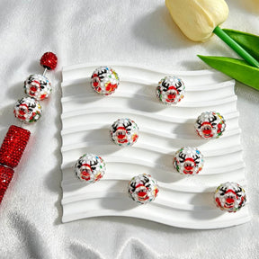 20mm round rhinestone beads featuring a festive Christmas reindeer design. Sparkly surface with red, green, and silver tones, perfect for beadable pens, keychains, and holiday jewelry making.