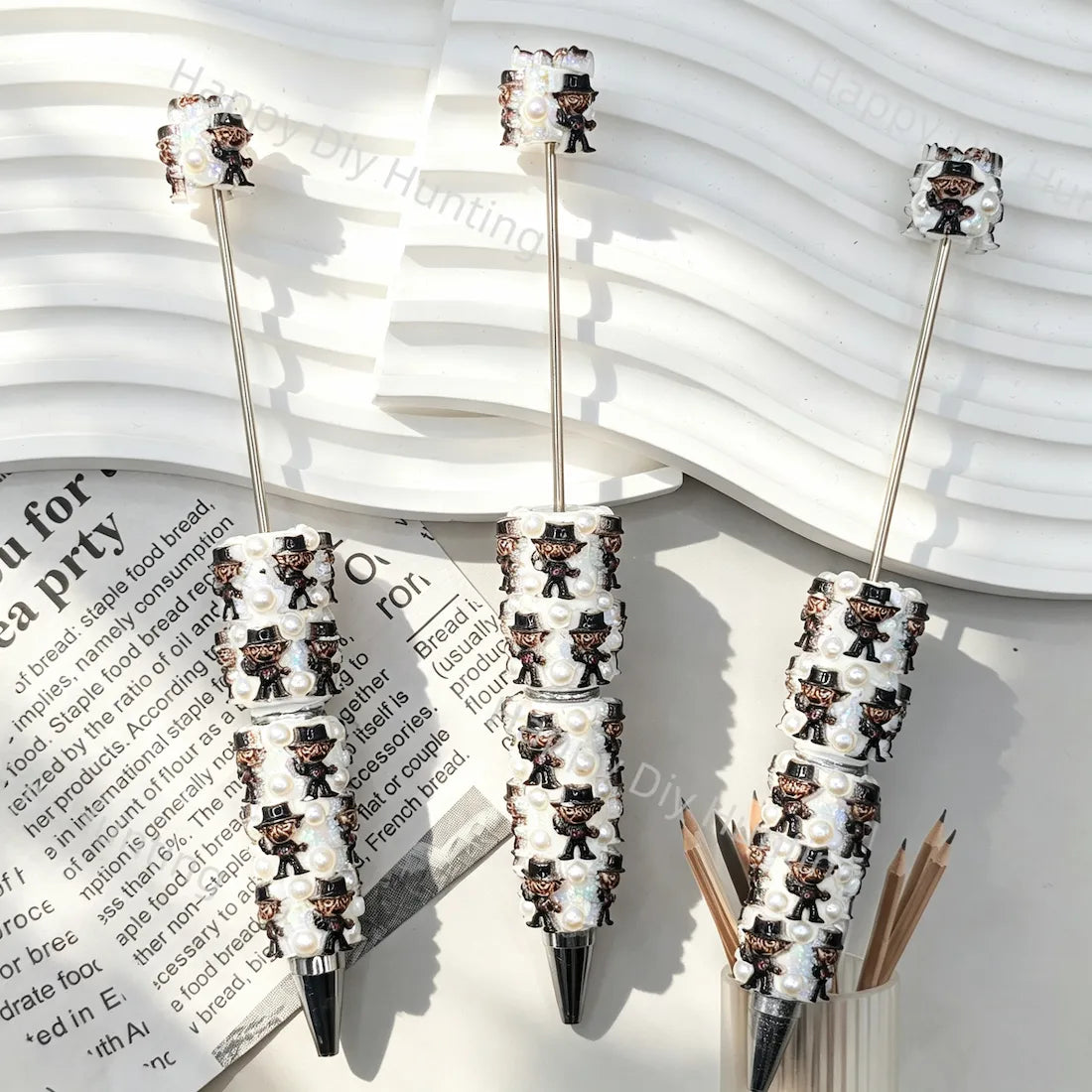 pre‑assembled top‑hat horror‑style 3D character figurine beadable pens, white base decorated with faux pearls, spooky halloween themed craft ballpoint pens bulk