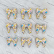 3D Winnie-themed Bowknot Silicone Focal Beads Wholesale, silicone focal beads for pens