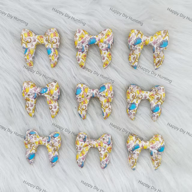 3D Winnie-themed Bowknot Silicone Focal Beads Wholesale, silicone focal beads for pens