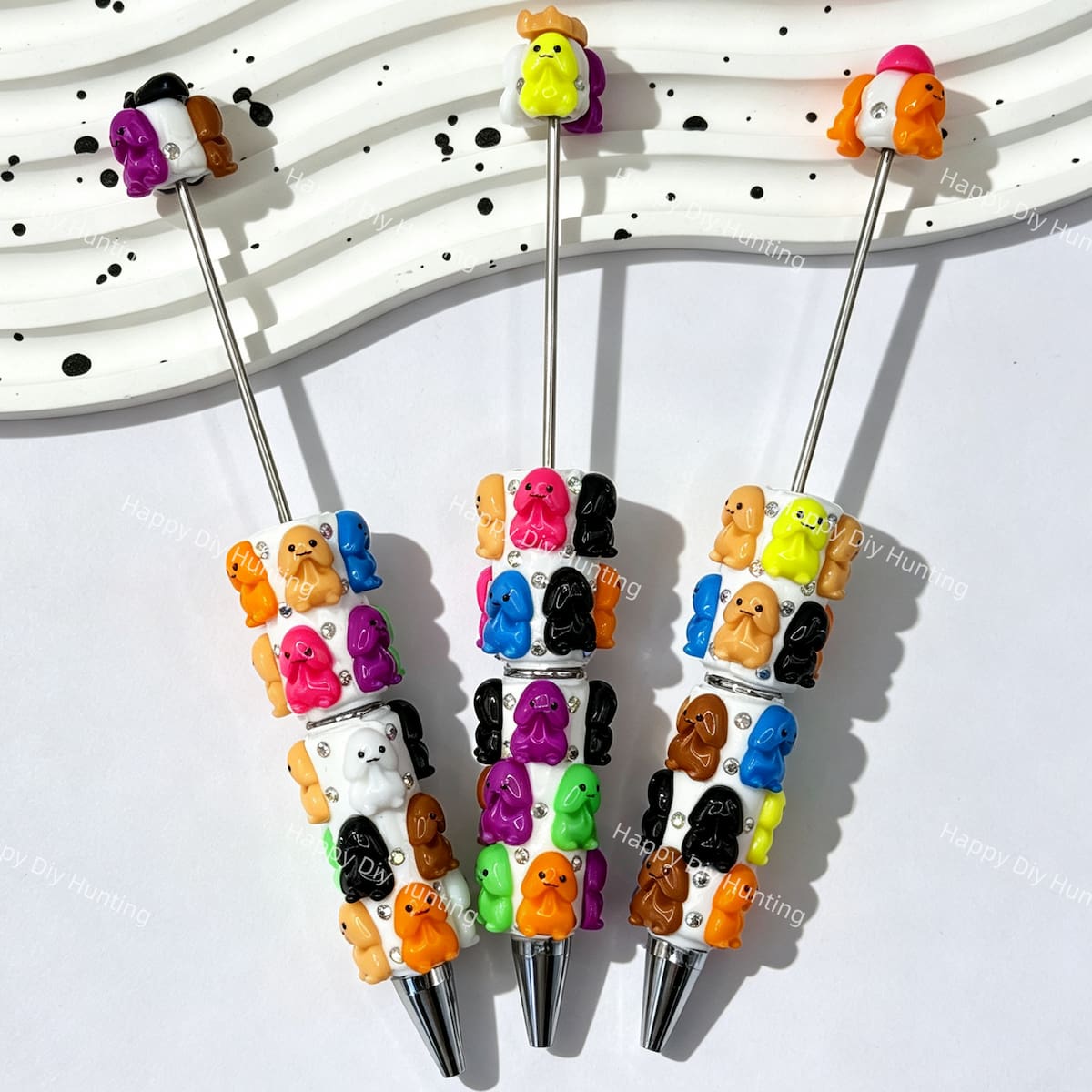 close-up 3D colorful Richard beadable pen showing dimensional character design and beadable barrel