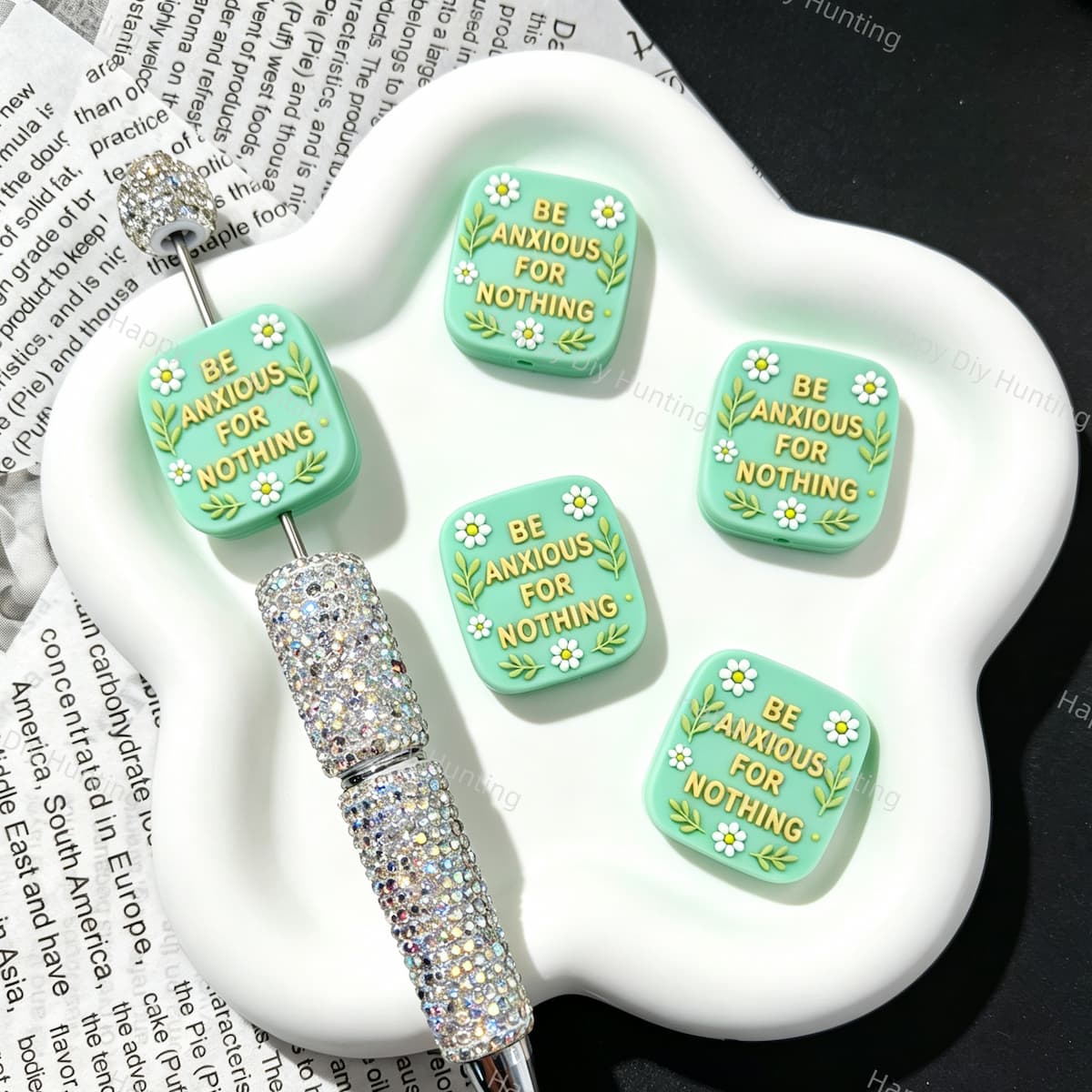 Silicone focal beads featuring a "Be Anxious For Nothing" inspirational message and square graphic design. Soft, durable, and flexible, perfect for beadable pens, keychains, and handmade crafts.