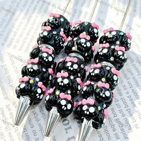 black 3d cute round face character beadable pens with pink bow and rhinestone accents for diy handmade kawaii stationery crafts wholesale