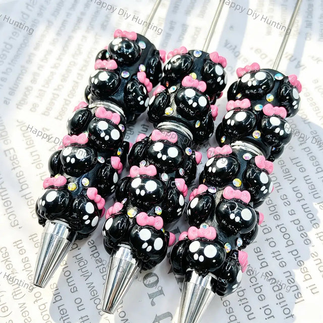black 3d cute round face character beadable pens with pink bow and rhinestone accents for diy handmade kawaii stationery crafts wholesale