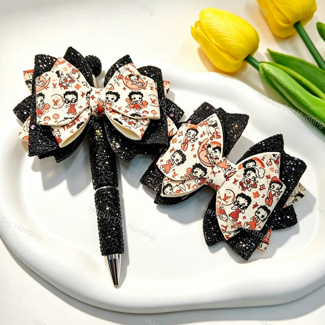 Black layered glitter bow beads featuring a BB cartoon print design. Lightweight, sparkly, and smooth, perfect for beadable pens, keychains, and handmade crafts.