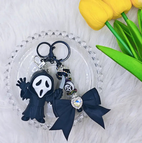 Black_Ghost_Face_with_Knife_3D_Printed_Pen_Topper-keychain-decoration-display