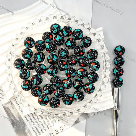 Black base full print round silicone beads with teal blue hand silhouette and red heart graffiti patterns for diy handmade beadable pen wholesale craft accessories