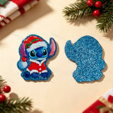 A blue alien character wearing a Santa hat and red suit, shown from the front and back. The front features a detailed printed design, while the back is covered in blue glitter. Perfect for DIY beadable pens, keychains, and handmade holiday crafts.