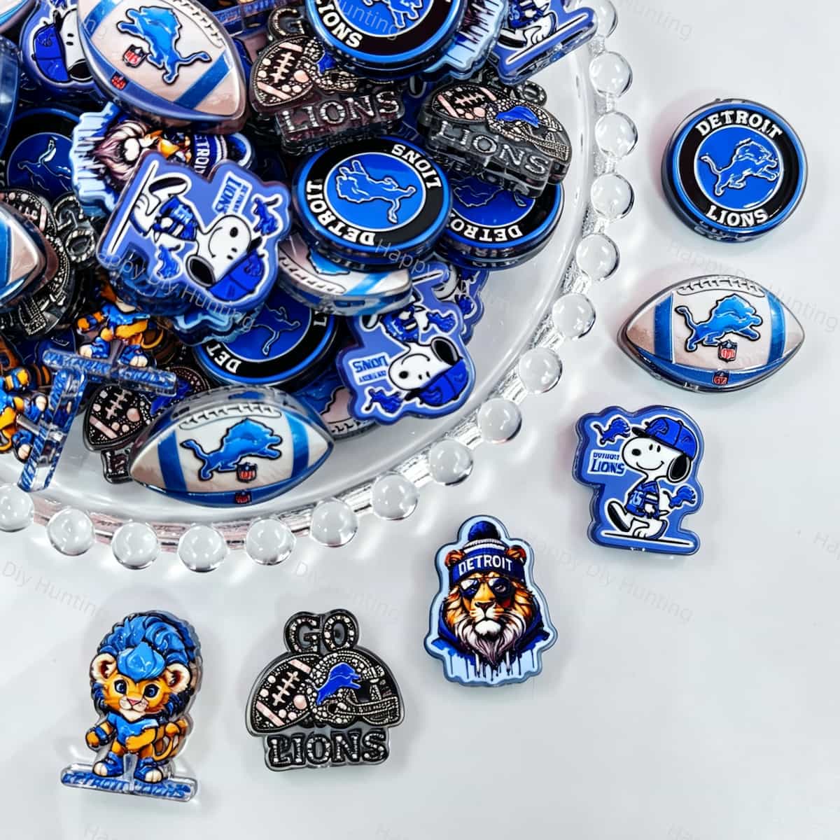 Acrylic focal beads featuring a blue lion football themed print design. Lightweight, sporty, and durable, perfect for beadable pens, keychains, and handmade crafts.
