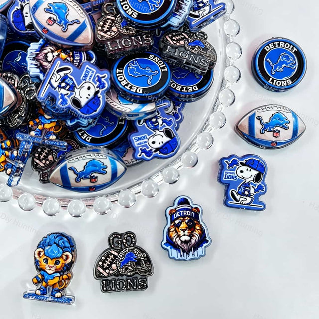 Acrylic focal beads featuring a blue lion football themed print design. Lightweight, sporty, and durable, perfect for beadable pens, keychains, and handmade crafts.