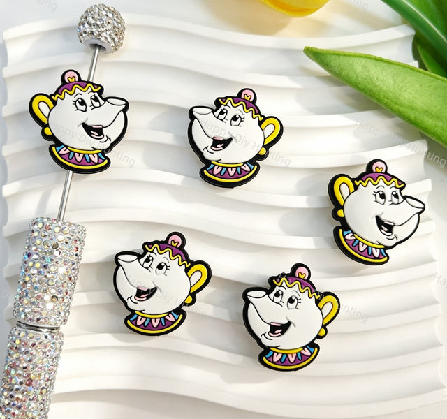 Silicone focal beads featuring a cute cartoon teapot character design. Soft, durable, and flexible, perfect for beadable pens, keychains, and handmade crafts.