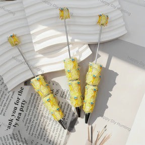 cheerful bright yellow whimsical little character print beadable pens for diy silicone focal bead craft wholesale