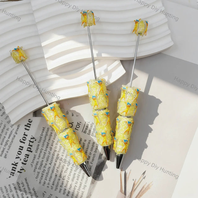 cheerful bright yellow whimsical little character print beadable pens for diy silicone focal bead craft wholesale
