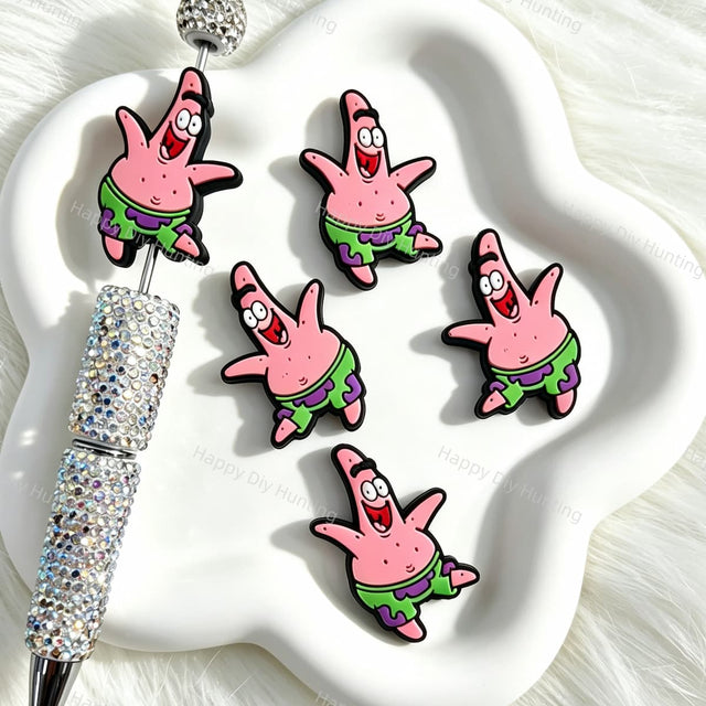 Silicone focal beads featuring a cheerful pink starfish cartoon design. Soft, durable, and flexible, perfect for beadable pens, keychains, and handmade crafts.