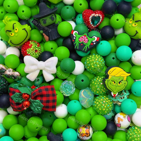 Christmas Green Silicone & Acrylic bead mix closeup, festive holiday green mixed focal beads with grinch charms for diy beadable pens