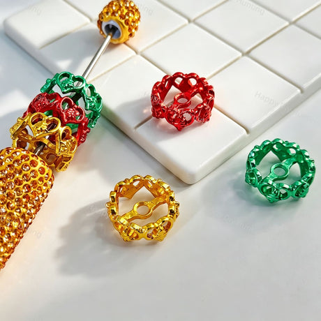 Christmas color hollow heart metal bead caps and spacer findings designed to fit 20mm beads. Sturdy, shiny, and festive, perfect for beadable pens, keychains, and handmade holiday crafts.