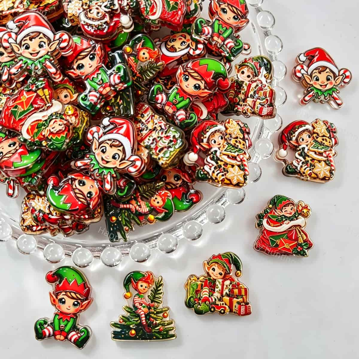 	Acrylic focal beads featuring a Christmas elf print design. Lightweight, festive, and durable, perfect for beadable pens, keychains, and handmade holiday crafts.