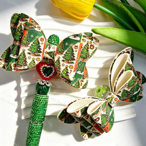Bow-shaped beads featuring a Christmas pine tree print design. Lightweight, festive, and durable, perfect for beadable pens, keychains, and handmade holiday crafts.
