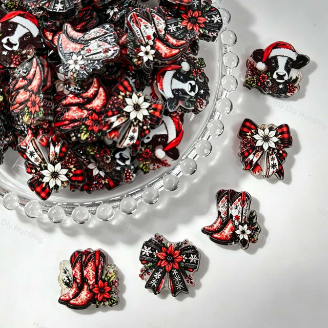 Acrylic focal beads featuring a Christmas western cowboy, cow, bow, and boot print design. Lightweight, rustic, and durable, perfect for beadable pens, keychains, and handmade holiday crafts.