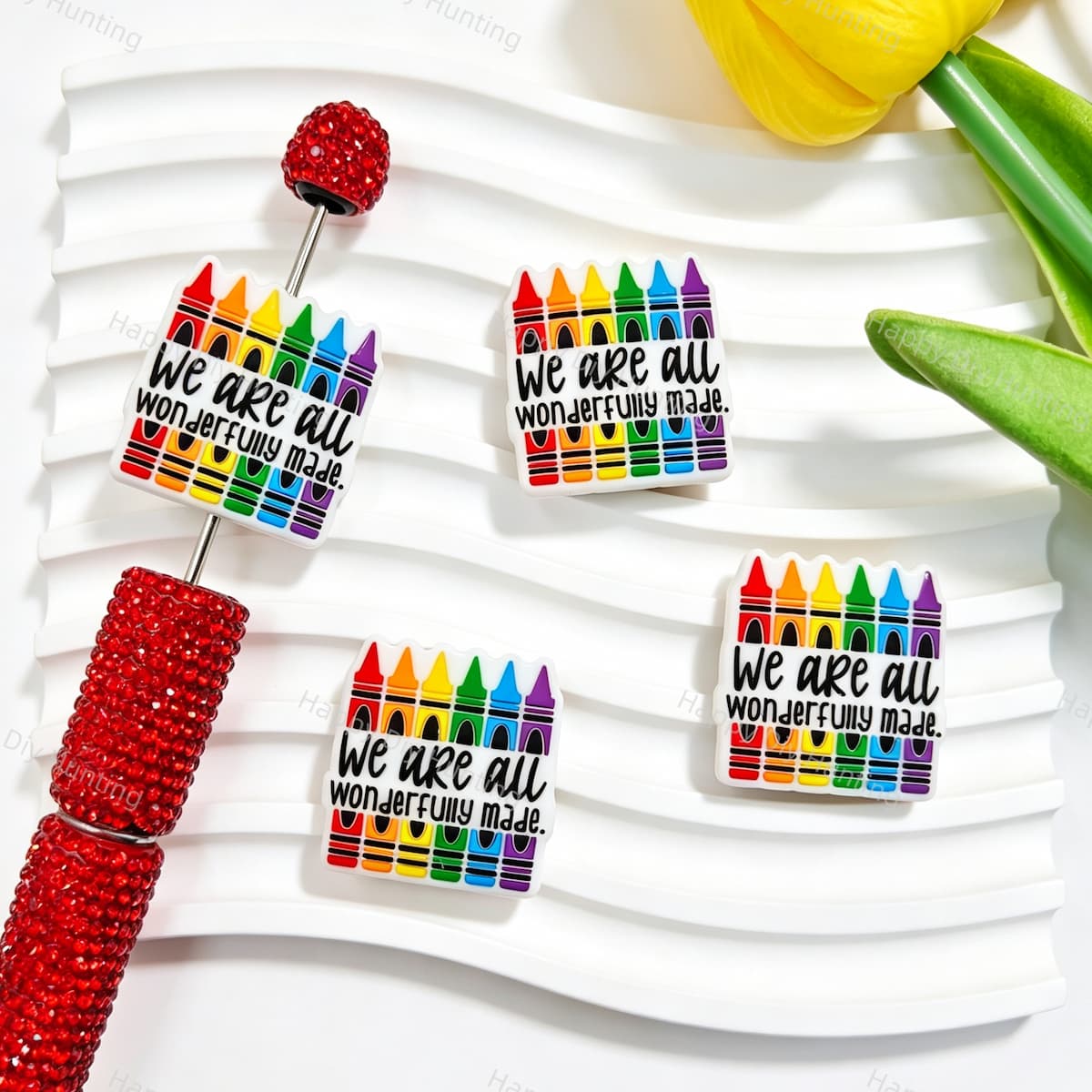 Silicone focal beads featuring a colorful crayon design with text details. Soft, durable, and flexible, perfect for beadable pens, keychains, and handmade crafts.
