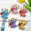 Five crown alien metal fancy beads with rhinestones displayed on a white wavy tray. Colors include blue, pink, red, purple, and yellow, each holding a red rose with a gold crown. Perfect for DIY beadable pens, keychains, and handmade crafts.