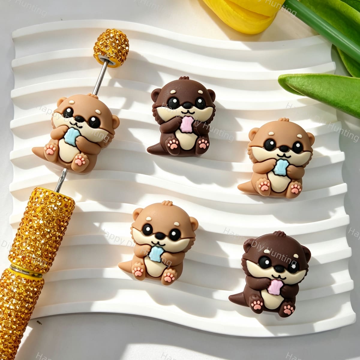 Silicone focal beads featuring a cute 3D otter holding a shell design. Soft, durable, and flexible, perfect for beadable pens, keychains, and handmade crafts.