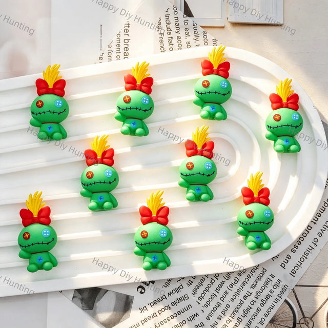 Cute green stitched rag doll 3D cartoon pen toppers with red bow and spiky hair, handmade bead pen decorative figure caps for wholesale craft supplies