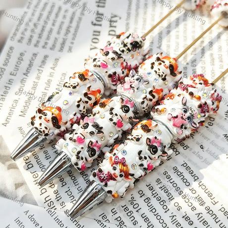 cute spotted cow beadable pens with white resin and tiny rhinestones for diy handmade craft stationery wholesale