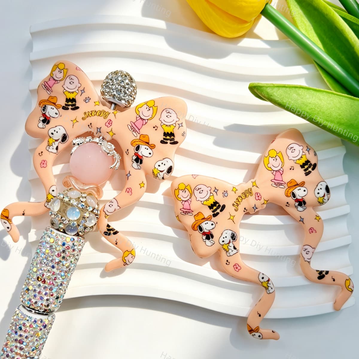 Bow-shaped silicone focal beads featuring a cute cartoon puppy and friends print design. Soft, durable, and flexible, perfect for beadable pens, keychains, and handmade crafts.